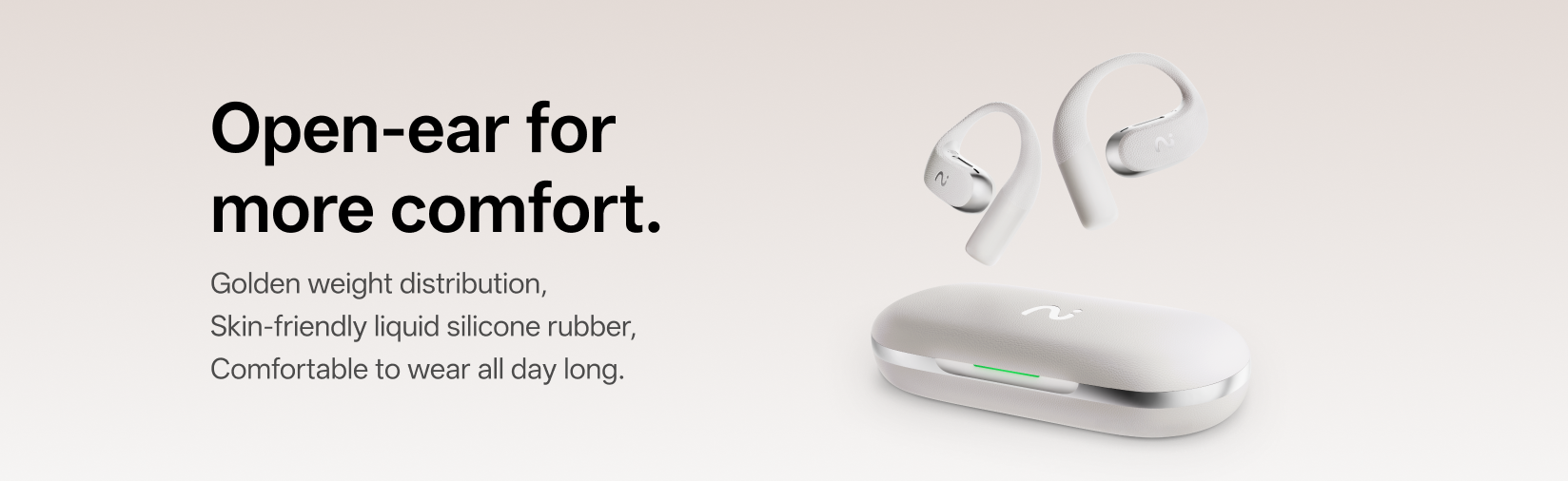 White open-ear wireless earbuds with text on comfort and features on a light background
