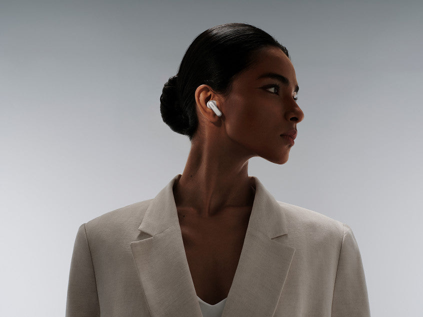 Tap an earbud.